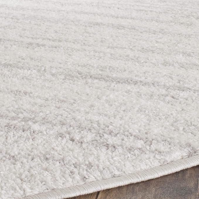 SAFAVIEH Adirondack Collection Area Rug - 7' Round, Ivory & Silver, Modern Ombre Design, Non Shedding & Easy to Clean, Ideal for Living Room, Bedroom, Office, Dining Space (ADR113B)