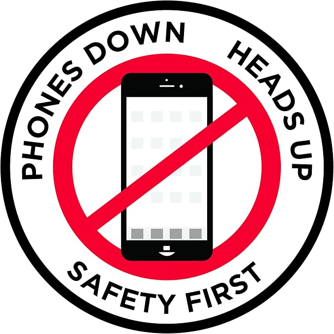"Phones Down Heads Up" Safety Sign by GraphicalWarehouse