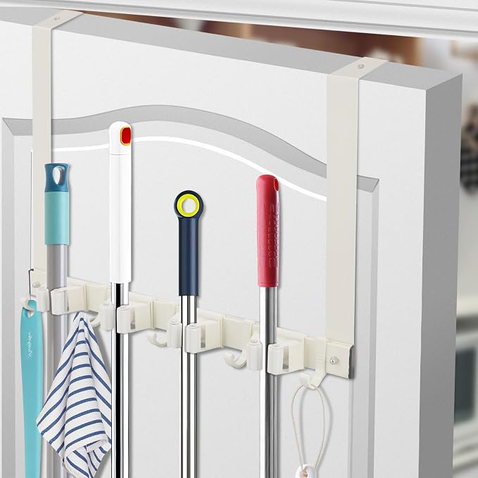 Over Door Movable Broom and Mop Hanging Holder by SLIIMU
