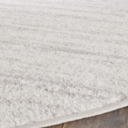 SAFAVIEH Adirondack Collection Area Rug - 7' Round, Ivory & Silver, Modern Ombre Design, Non Shedding & Easy to Clean, Ideal for Living Room, Bedroom, Office, Dining Space (ADR113B)