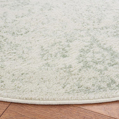 SAFAVIEH Adirondack Collection Area Rug - 4' Round, Ivory & Sage, Distressed Vintage Floral Design, Non-Shedding & Easy to Clean, Ideal for Living Room, Bedroom, Dining Space (ADR109V)