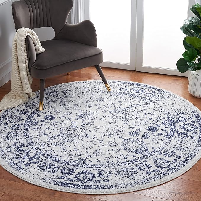 SAFAVIEH Adirondack Collection Area Rug - 4' Round, Ivory & Navy, Distressed Vintage Floral Design, Non-Shedding & Easy to Clean, Ideal for Living Room, Bedroom, Dining (ADR109M)