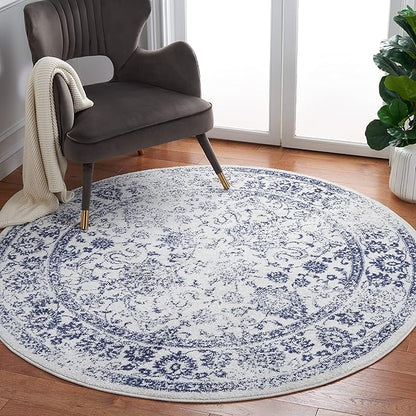 SAFAVIEH Adirondack Collection Area Rug - 4' Round, Ivory & Navy, Distressed Vintage Floral Design, Non-Shedding & Easy to Clean, Ideal for Living Room, Bedroom, Dining (ADR109M)