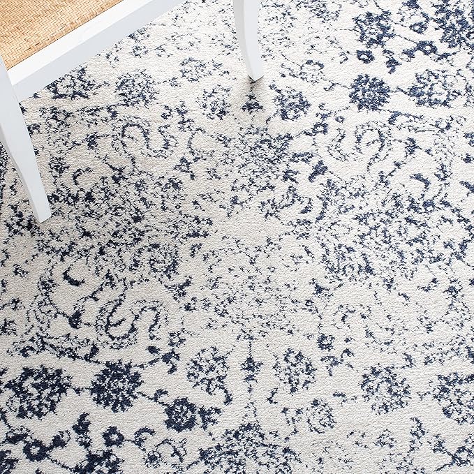 SAFAVIEH Area Rug 10x14 - Adirondack Collection - Large - Ivory & Navy, Distressed Vintage Floral Design, Non-Shedding & Easy to Clean, Ideal for Living Room, Bedroom, Dining Space (ADR109M)