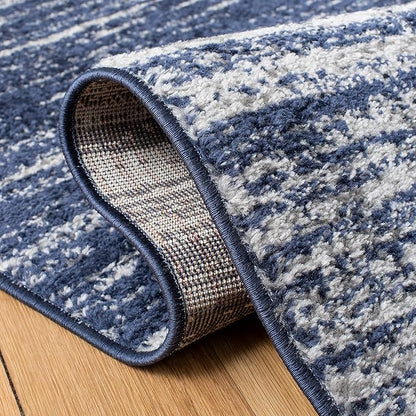 SAFAVIEH Adirondack Collection Accent Rug - 4'5" x 6'5", Navy & Grey, Modern Ombre Design, Non Shedding & Easy to Clean, Ideal for Living Room, Bedroom, Office, Dining Space (ADR113E)