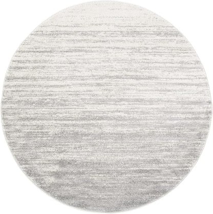 SAFAVIEH Adirondack Collection Area Rug - 7' Round, Ivory & Silver, Modern Ombre Design, Non Shedding & Easy to Clean, Ideal for Living Room, Bedroom, Office, Dining Space (ADR113B)