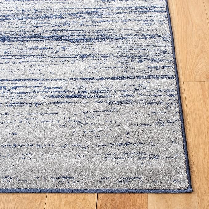 SAFAVIEH Adirondack Collection Accent Rug - 4'5" x 6'5", Navy & Grey, Modern Ombre Design, Non Shedding & Easy to Clean, Ideal for Living Room, Bedroom, Office, Dining Space (ADR113E)