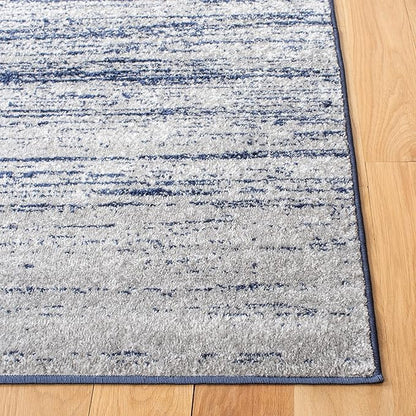 SAFAVIEH Adirondack Collection Accent Rug - 4'5" x 6'5", Navy & Grey, Modern Ombre Design, Non Shedding & Easy to Clean, Ideal for Living Room, Bedroom, Office, Dining Space (ADR113E)